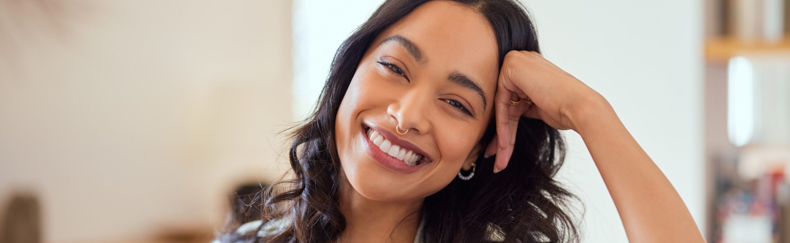 smiling-mixed-race-woman-looking-at-camera-2023-11-27-05-12-21-utc (1)