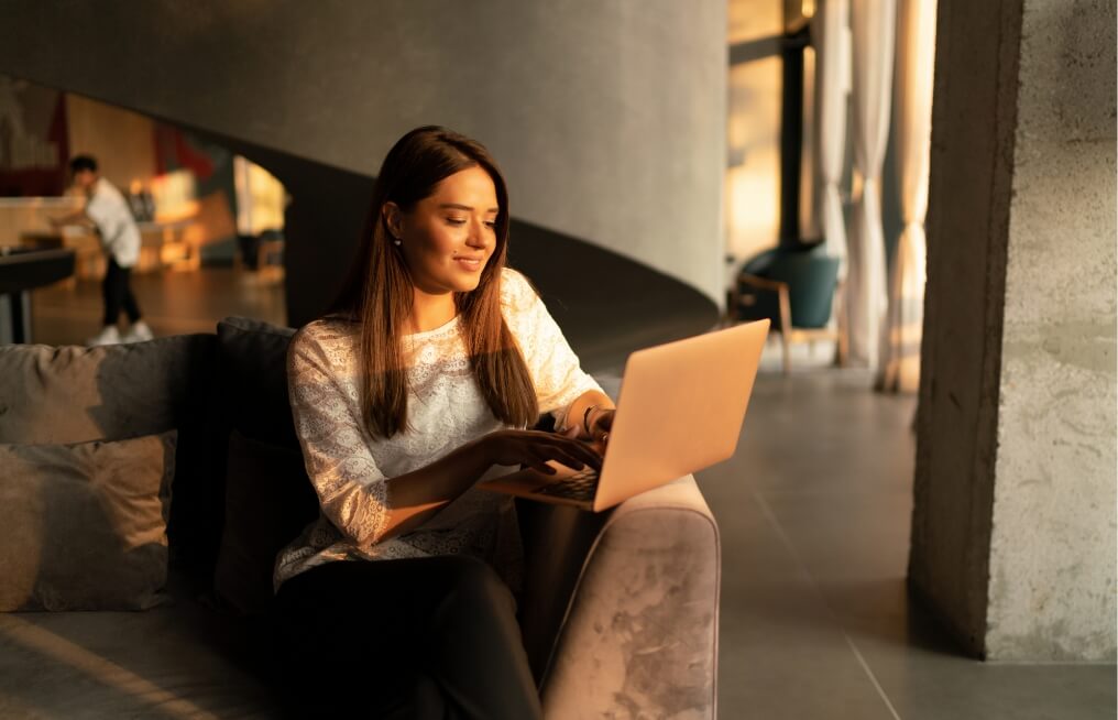 the-young-charming-business-woman-at-the-laptop-2023-11-27-05-30-17-utc (1)